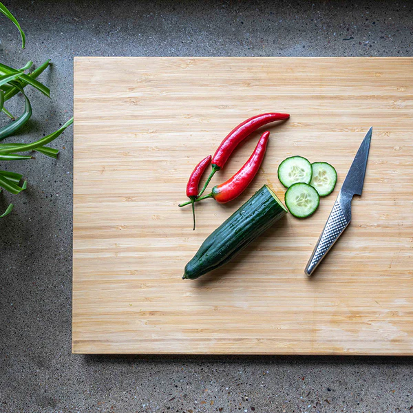 meater cutting board flat side with produce.webp
